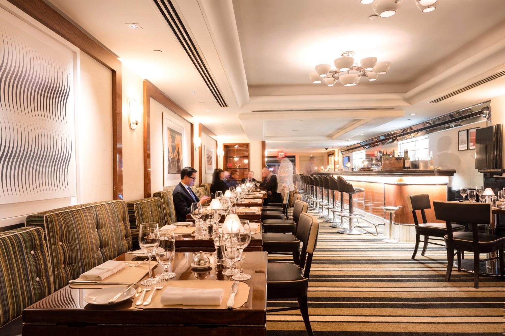 The Pierre, A Taj Hotel, New York Bagian luar foto The interior of the restaurant